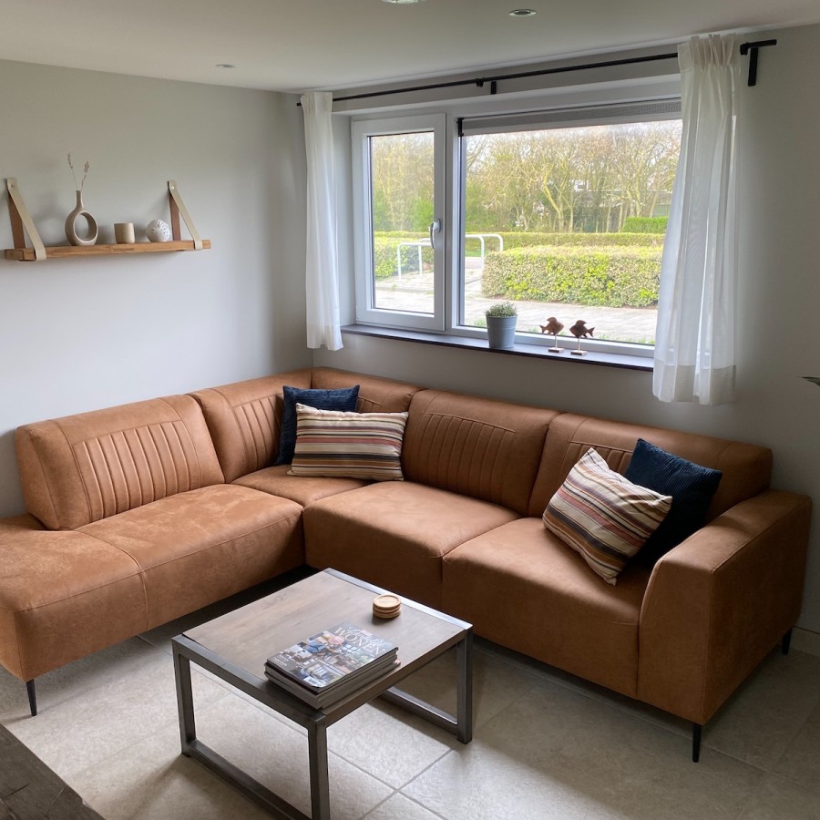 Vakantiewoning Westkaap woonkamer met loungebank